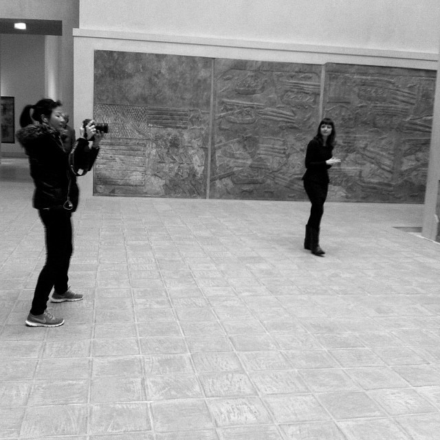 ane Han with Creative Director and docent Emma Durrant-Lennon filming in the Khorsabad Palace rooms at the Louvre. 