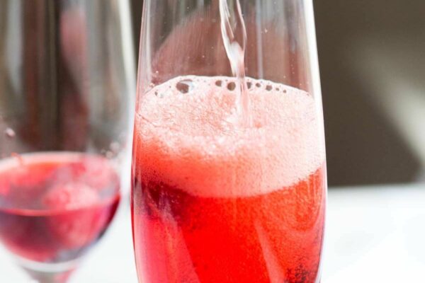 Kir aperitif in a champagne glass